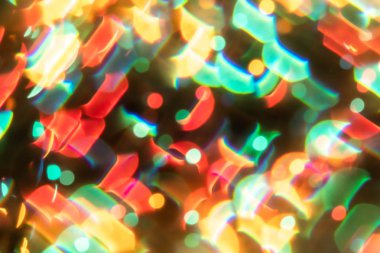 Çok renkli bulanıklık bokeh kristal ışık soyut arka plan.