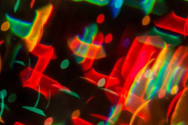 Çok renkli bulanıklık bokeh kristal ışık soyut arka plan.