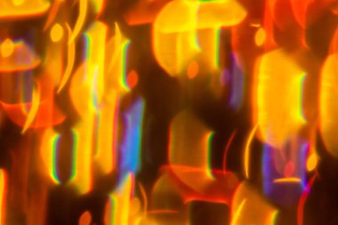 Çok renkli bulanıklık bokeh kristal ışık soyut arka plan.