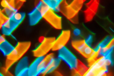 Çok renkli bulanıklık bokeh kristal ışık soyut arka plan.