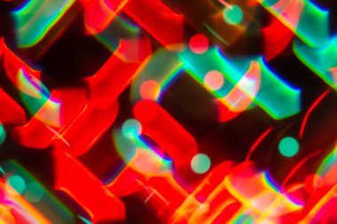 Çok renkli bulanıklık bokeh kristal ışık soyut arka plan.