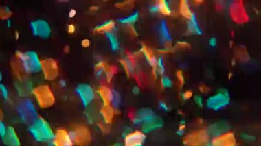 Çok renkli bulanıklık bokeh kristal prizma ışık soyut arka plan. 001. 4k
