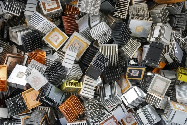 Scrap yard electronic waste for recycling with selective focus. electronic aluminium waste