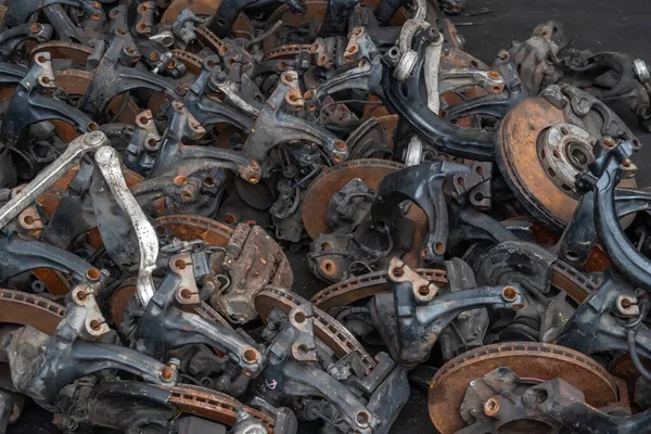 used brake rotor and car part at junkyard or scrapyard for recycling