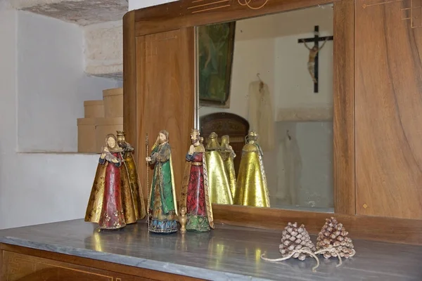 Inside the Trullo Sovrano at Alberobello, Apulia, Italy. Trullo Sovrano is built on two levels with internal staircase. Alberobello is a small town in southern Italy. A trullo is a traditional Apulian dry stone hut with a conical roof.