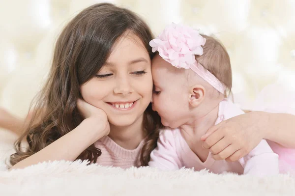 Two Sisters Playing Light Background — Stock Photo, Image