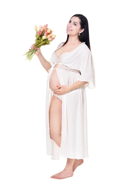 美丽的孕妇与花卉在白色背景下隔离 — 图库照片