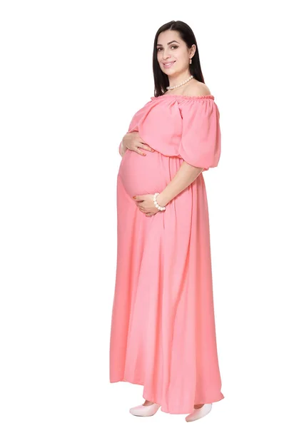Piękna Kobieta Ciąży Różowej Sukience Pozowanie Białym Tle — Zdjęcie stockowe