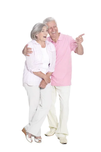 Full Length Portrait Senior Couple Pointing Something Isolated White Background — Stock Photo, Image