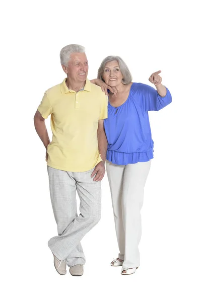 Full Length Portrait Senior Couple Pointing Something Isolated White Background — Stock Photo, Image