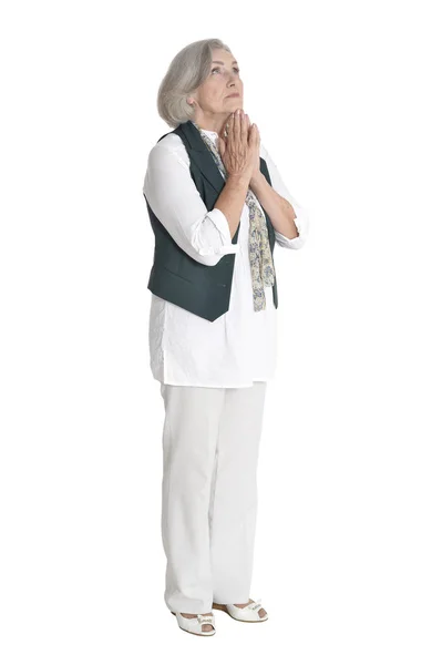 Senior vrouw bidden — Stockfoto
