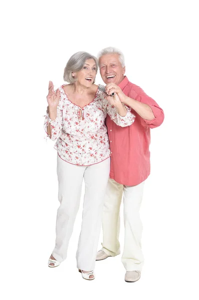 老夫妇的肖像在白色背景下独立演唱 — 图库照片