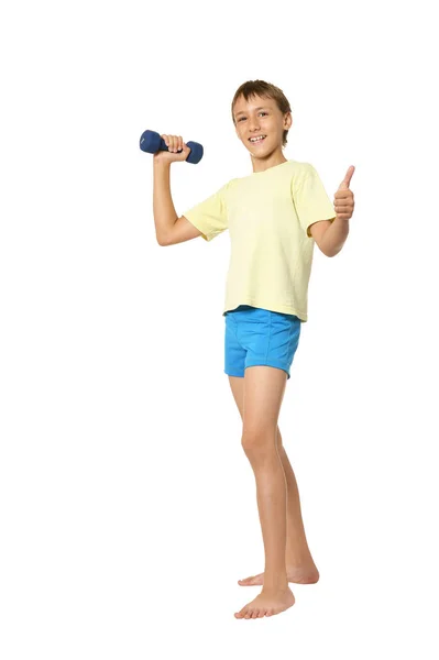 Young boy doing exercises — Stock Photo, Image