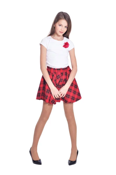 スカートは 白い背景で隔離ポーズで美しい少女 — ストック写真