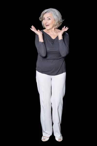 Senior Vrouw Poseren Geïsoleerd Terug Achtergrond — Stockfoto