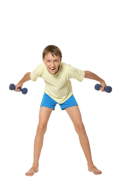Mladý chlapec dělat cvičení — Stock fotografie