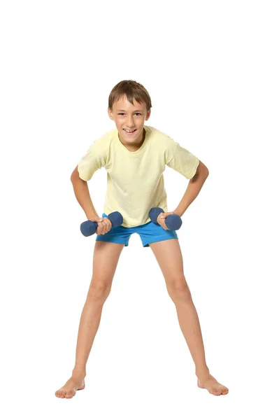 Young boy doing exercises — Stock Photo, Image