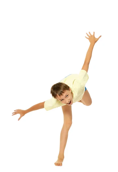 Young boy doing exercises — Stock Photo, Image