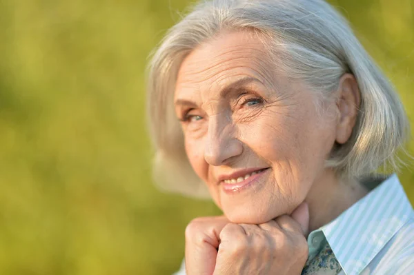 Happy Elderly Woman Posing Outdoors — Stock Photo, Image