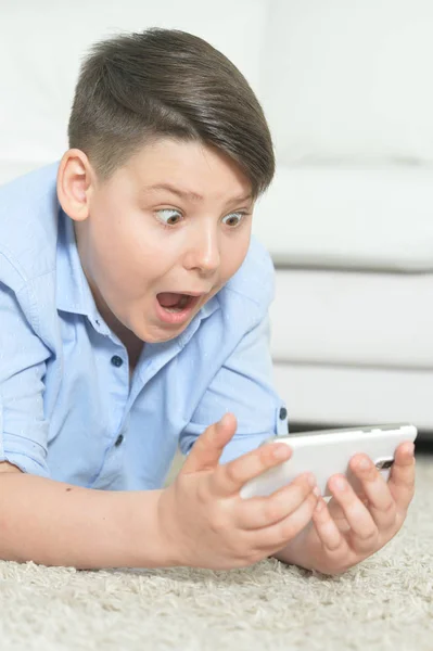 Exited Boy Smartphone Playing Game Home — Stock Photo, Image