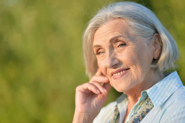 Happy Smiling Elderly Woman Posing Outdoors — Stock Photo, Image