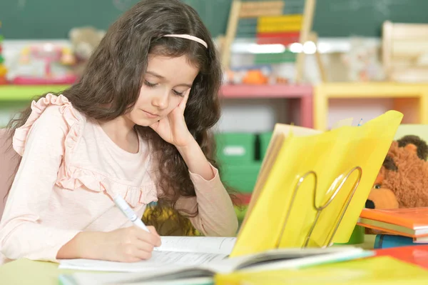 Cute Schoolgirl Doing Homework Classroom — Stock Photo, Image