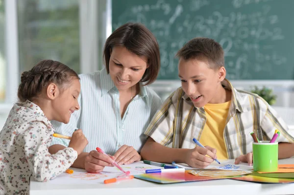 Children at school in the classroom — Stock Photo, Image