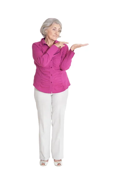 Senior Woman Showing Something Isolated White Background — Stock Photo, Image