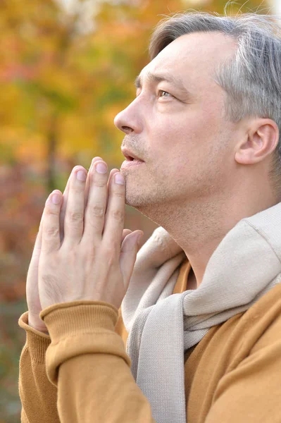 Portrait Handsome Man Praying Autumn Leaves Background — Stock Photo, Image