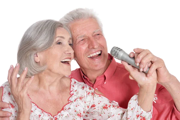 Coppia anziana con microfono — Foto Stock