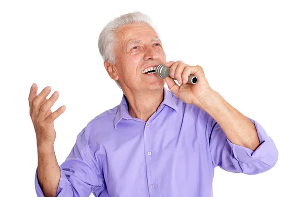 Senior man  singing into microphone — Stock Photo, Image