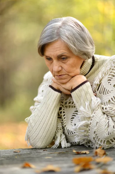 Senior woman in autumn — Stock Photo, Image