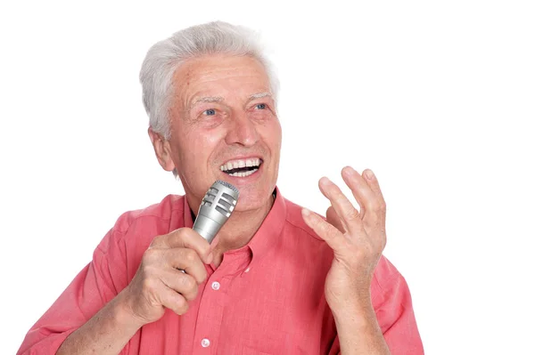 Mikrofonba énekel, magas rangú ember — Stock Fotó