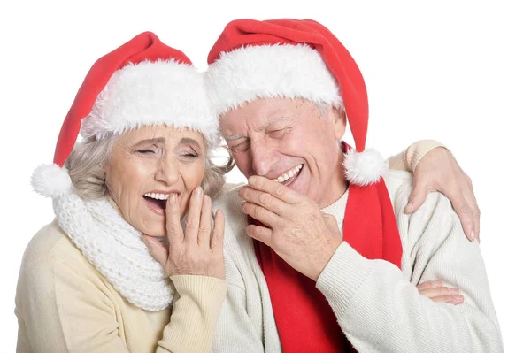年长的夫妇，在圣诞老人的帽子 — 图库照片