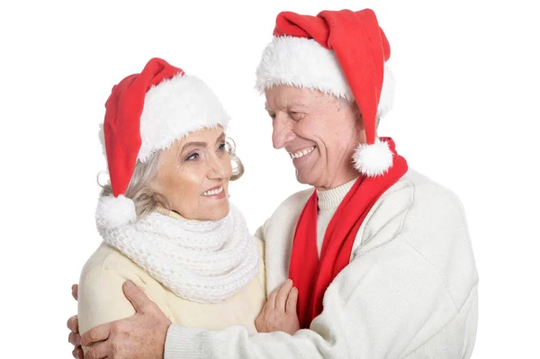 Couple aîné en chapeaux de Père Noël — Photo