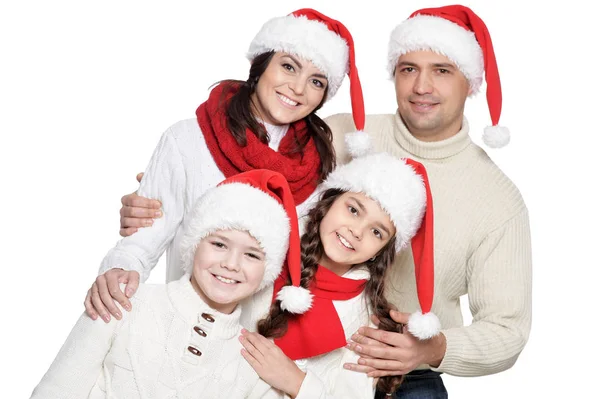 Famiglia con bambini in cappelli da Babbo Natale — Foto Stock