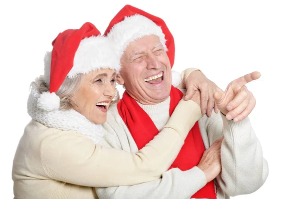 Äldre par i Santa hattar — Stockfoto