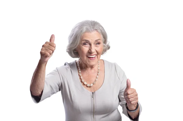 Портрет Красивой Пожилой Женщины Показывающей Большие Пальцы Белом Фоне — стоковое фото
