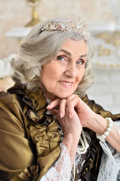 Beautiful Senior Woman Queen Indoors — Stock Photo, Image