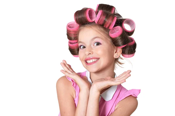 Pequena menina bonita em encrespadores de cabelo — Fotografia de Stock