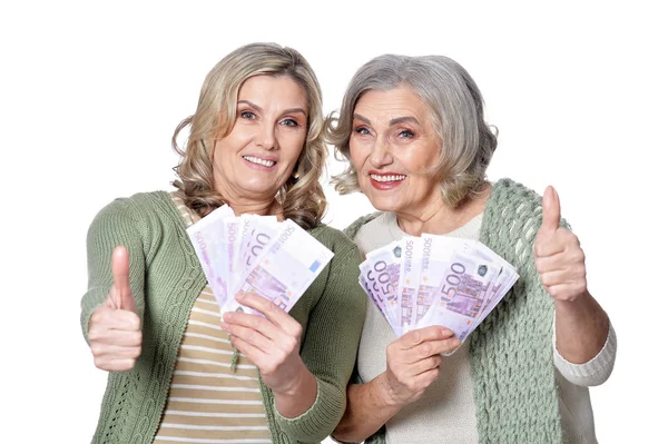 Femmes souriantes avec des billets d'argent — Photo