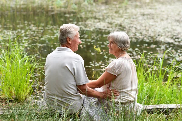 Nice Mature Couple Sitting Pond — Stock Photo, Image