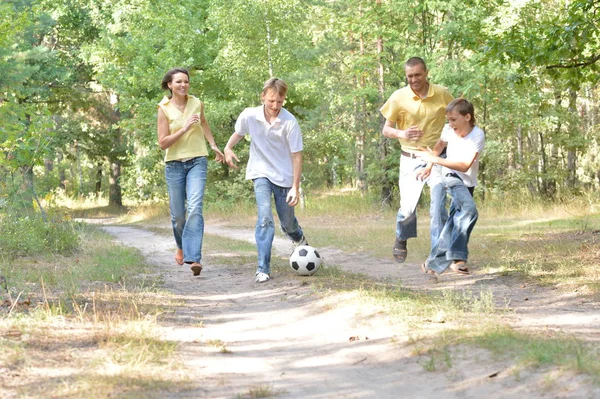 Family in a park — Stock Photo, Image