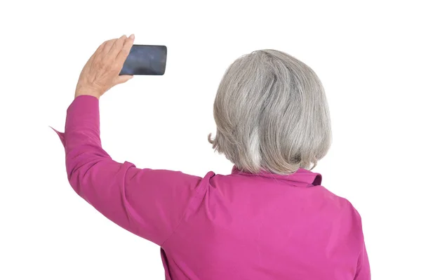 Senior Kobieta Biorąc Selfie Białym Tle — Zdjęcie stockowe