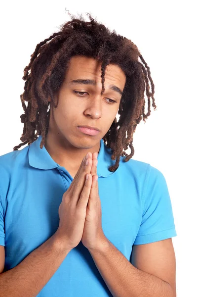 Mladý Muž Modlí Před Bílým Pozadím — Stock fotografie