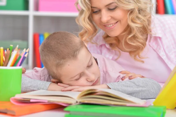 Tired Boy Sleeping Books Home Mother Waking Her Son — Stock Photo, Image