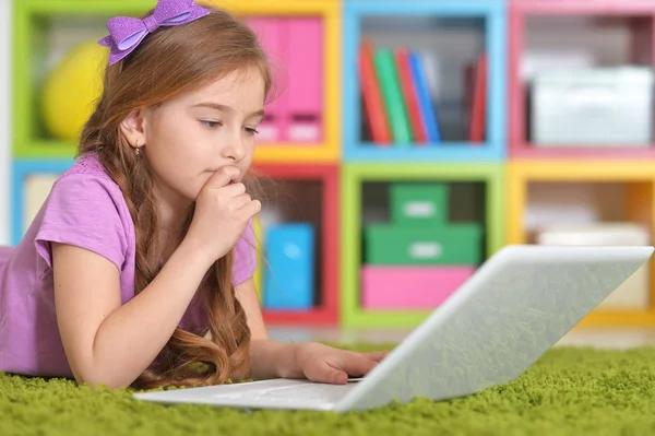 Girl using modern laptop — Stock Photo, Image