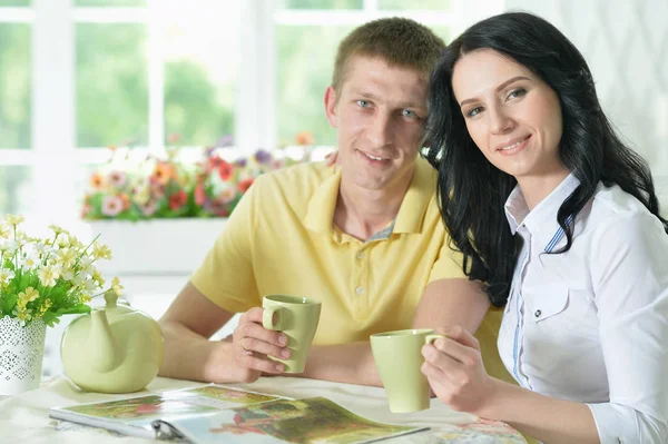 Happy Young Couple Reading Interesting Book — Stock Photo, Image