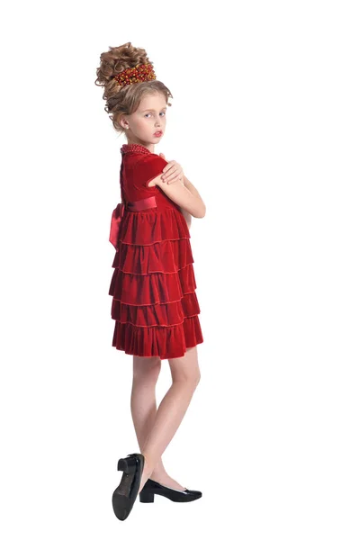 포즈에 배경에 빨간색 드레스에 귀여운 — 스톡 사진