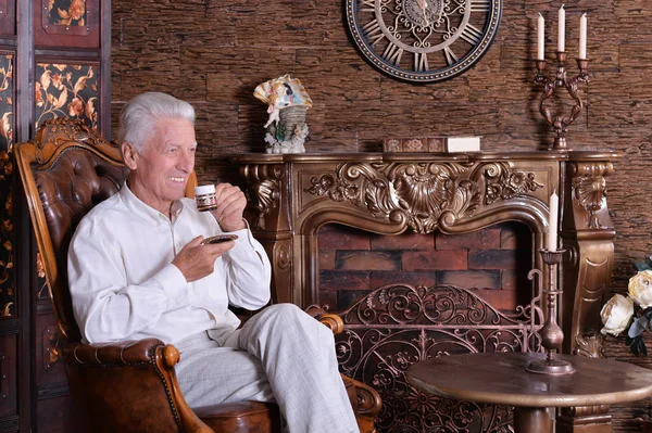 Smiling Senior Man Drinking Coffee Home — Stock Photo, Image